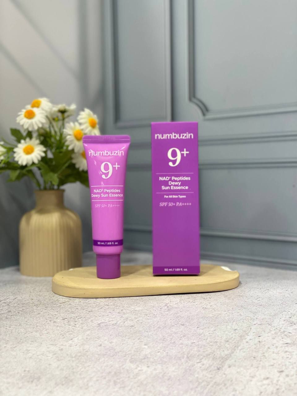 ضد آفتاب نامبوزین شماره ۹ پلاس مدل NAD+ Peptides Dewy Sun Essence SPF50+ PA++++